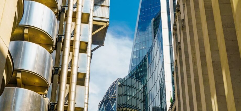 London financial district high rise buildings representing company ownership of UK property