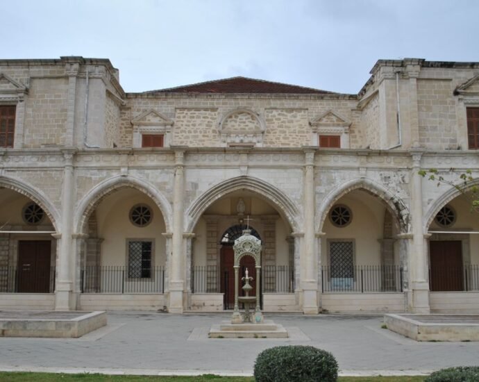 Historic stone building facade representing a Grade II listed luxury property