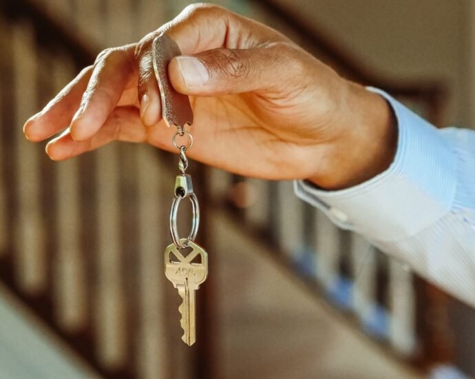 House key on a keychain representing the process of selling UK property as a non-resident
